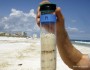 Pensacola Beach sample showing oil below clean surface.