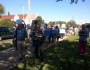 Protesters line sidewalk after being turned away from State Department meeting parking lot by Americans for Prosperity.