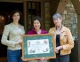 Monte Sano Civic Assoc, Pres. Marylynn Perry, Roxanne Paul & Team Leader Susan "Soos" Weber proudly display certificate. Photo by Jerry Green.