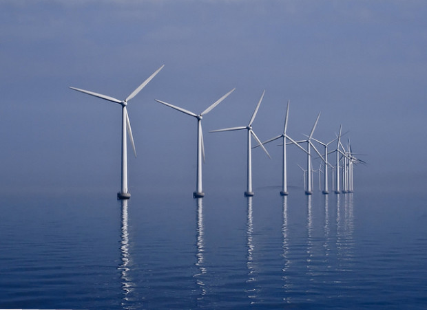 Offshore wind turbines located near Denmark. Flickr photo by Kim Hansen. 