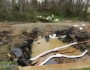 Exxon pipeline in creek