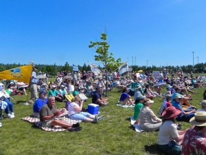 Hundreds of citizens concerned about the risks a 60-year-old oil pipeline beneath the Straits of Mackinac poses to the Great Lakes rally at Bridge View State Park at the north end of the Mackinac Bridge on Sunday, July 14
