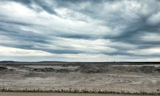 Pristine evergreen forest in Canada turned to barren landscape by tar sands extraction. Photo credit: Emma Pullman