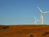 A pair of wind turbines Flickr photo by Mike Atkins.