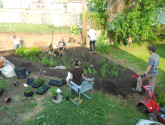 Installing a raingarden in a Washington DC backyard. Credit: A. Frayer