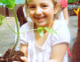 GirlWithTomatoPlant_VickiSando_219X219