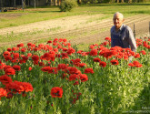 Kelly Moore grew a field of poppies in honor of her father, pictured, who was known for his own poppy garden earlier in life. Photo donated to the National Wildlife Photo Contest.