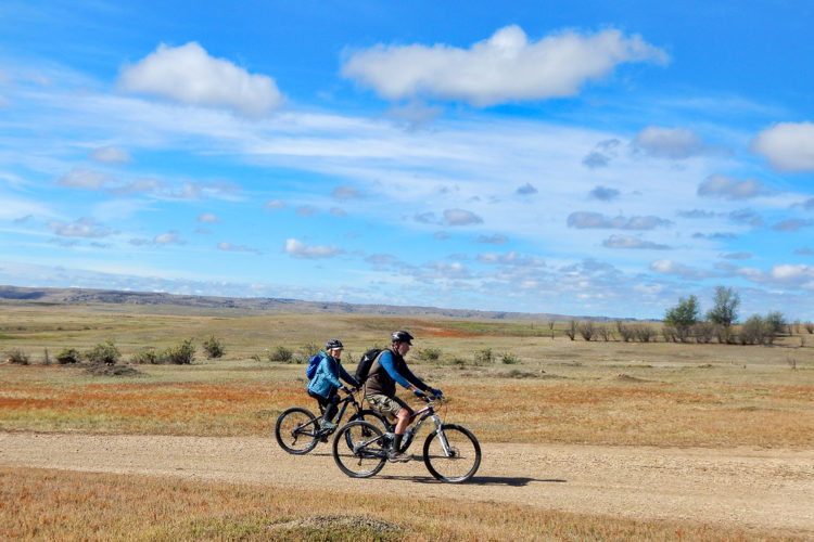 Bruce Wallace and Susie Cannell biked through prairie dog towns and a black-footed ferret recovery area on their 50-mile trek to the American Prairie Reserve. Photo by Steve Woodruff