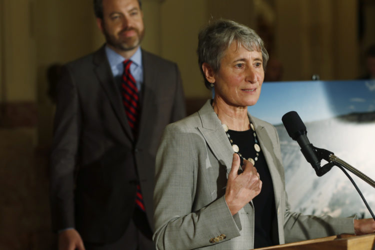 Interior Secretary Sally Jewell and BLM Diector Neil Kornze, in back, announce the cancellation of oil and gas leases in important fish and wildlife habitat in western Colorado. Image: NWF