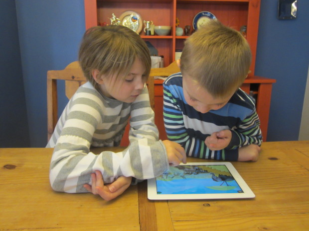 My kids playing on an iPad