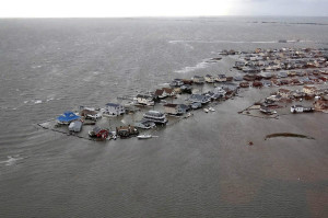 Hurricane Sandy crumbled coastal infrastructure and reminded us how expensive recovery efforts will be as storms intensify (flickr/U.S.Coast Guard)