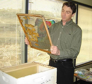 David teaching about beekeeping at an NWF employee event