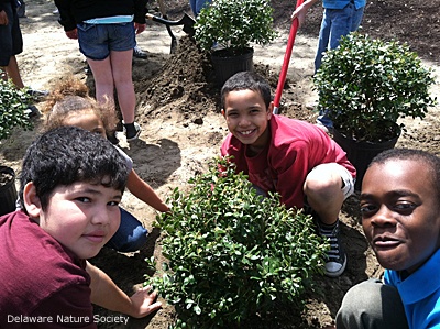 Students planting garden at Frederick Douglass Elementary School in Seaford, Delaware.