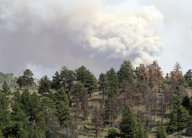Wildfires, driven by record heat and drought, are the face of climate change in the Southwest. Photo by Judith Kohler