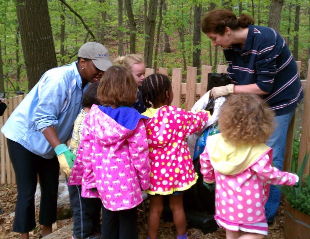 Students at a Montessori school in Northern Virginia learn about composting.