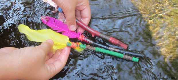 Fancy decorated sticks for racing in a stream