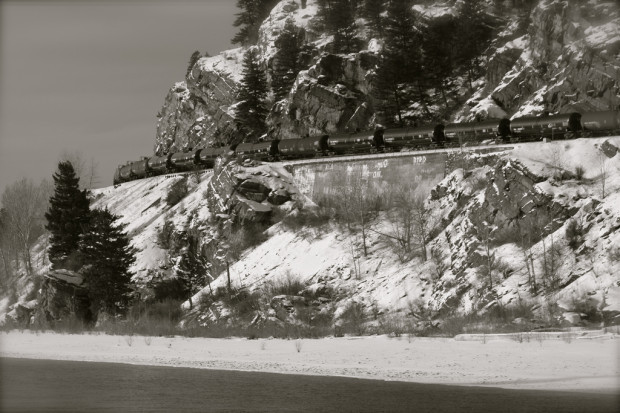 An oil transport train travels through Bad Rock Canyon, Montana, just west of Columbia Falls. Flickr photo by Roy Luck.