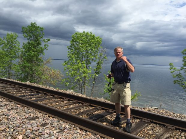train tracks along the banks of Lake Champlain