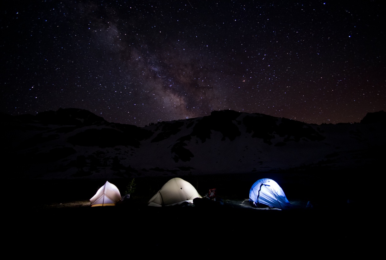 Tents under the night sky. (c) The Muir Project.