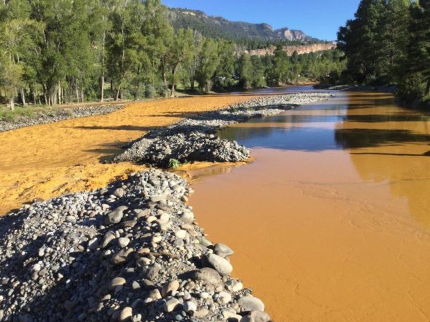 Photo of the Animas River, immediately after the spill. Photo by Tom McNamara of the La Plata County Emergency Management Office