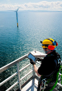 Service technician with a tablet at the Rhyl Flats offshore wind farm (UK). Photo: Siemens AG, Munich/Berlin 