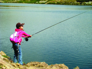Child fishing. Photo by Wyoming Wildlife Federation