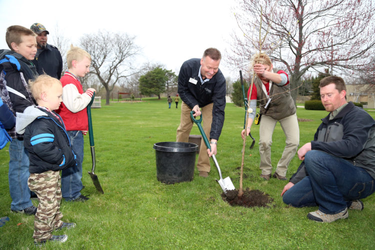 President Albrecht participating in a tree planting. Photo credit: Gateway Technical College