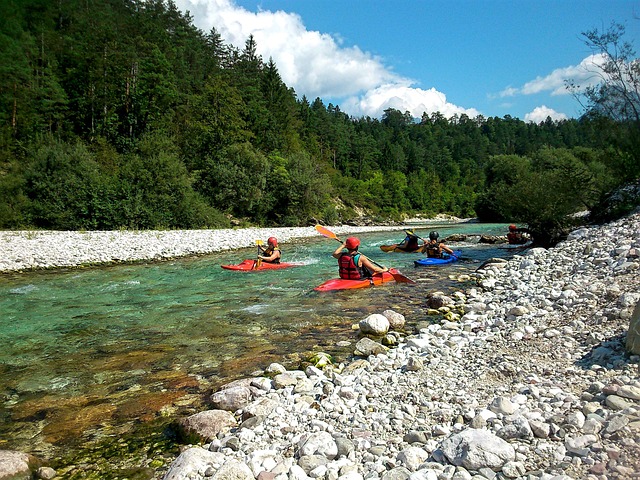 A group of people are kayaking on a river.