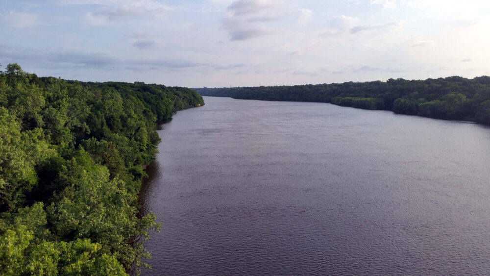 Aerial view of a wide river.