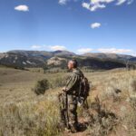 Author Jim Taylor looks out at mountain landscapes in Idaho.